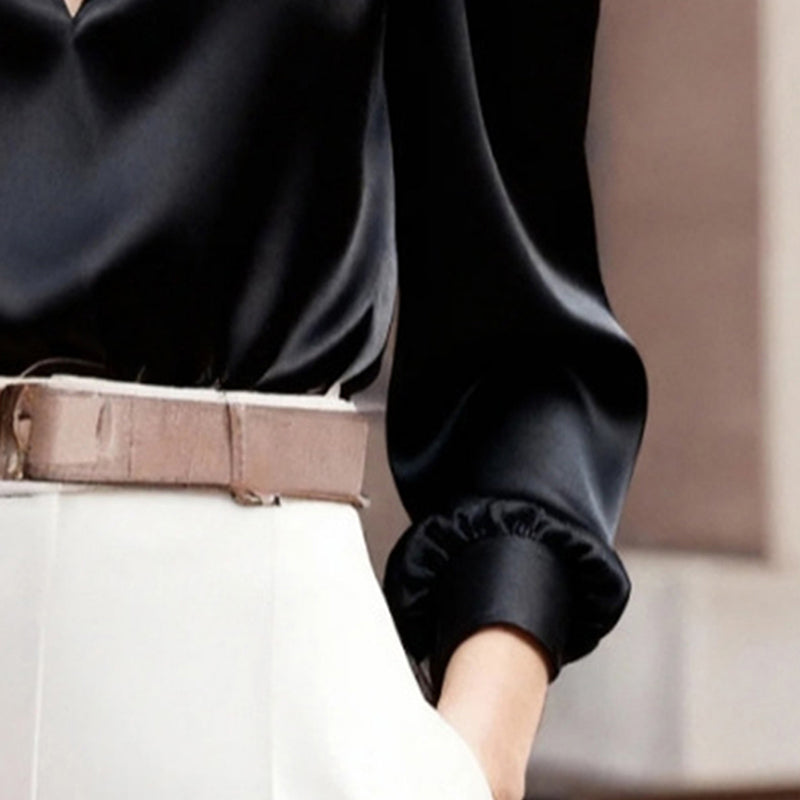 Blusa feminina elegante de manga comprida com decote em V.