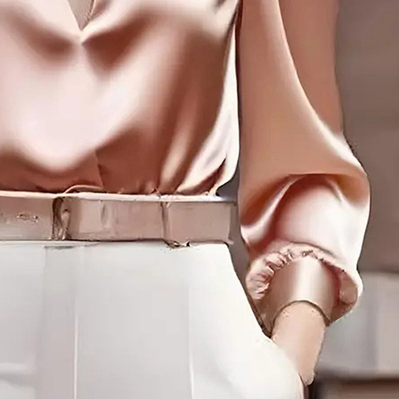 Blusa feminina elegante de manga comprida com decote em V.